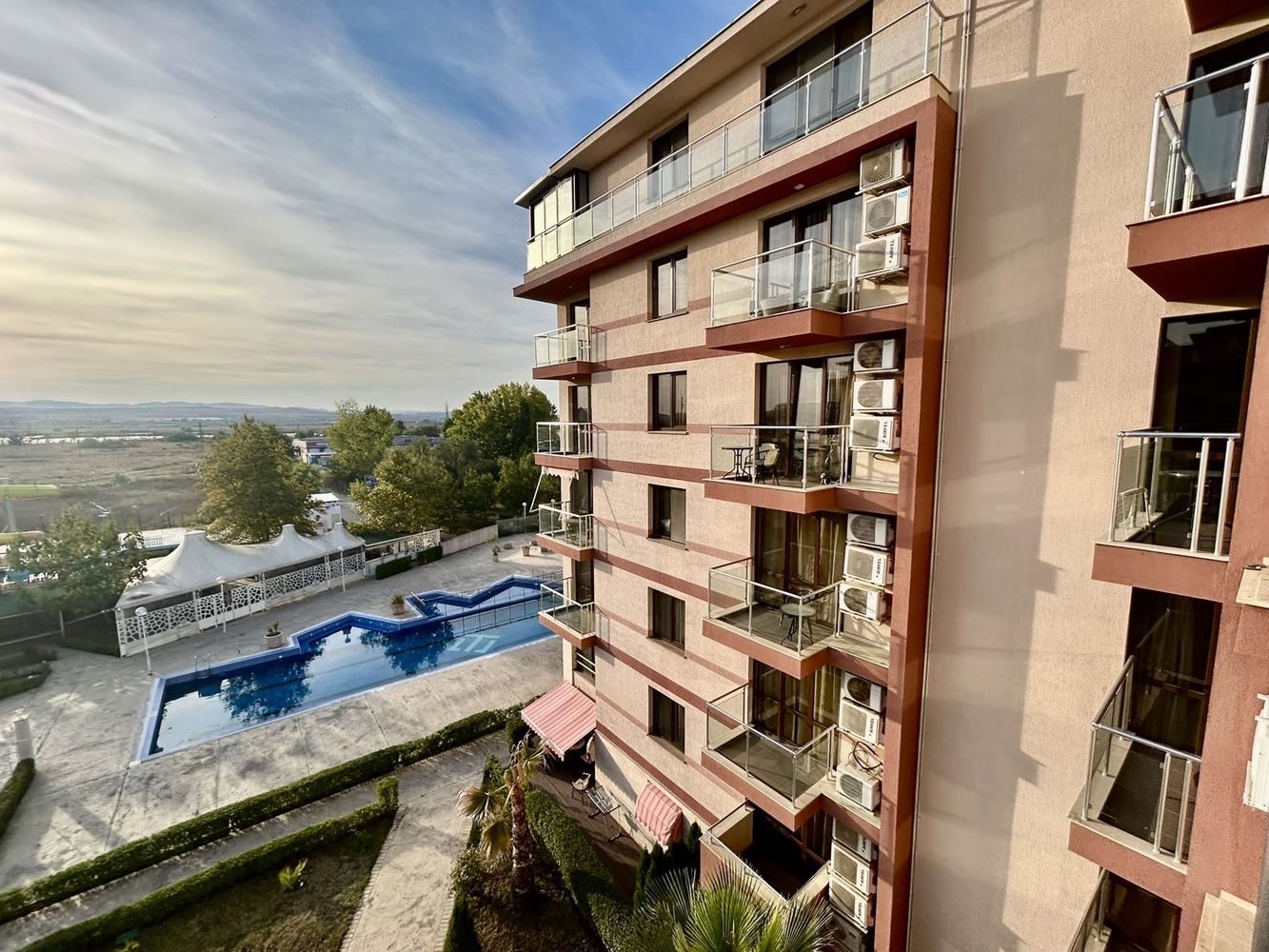Two-room apartment with a pool view in a complex with extensive infrastructure