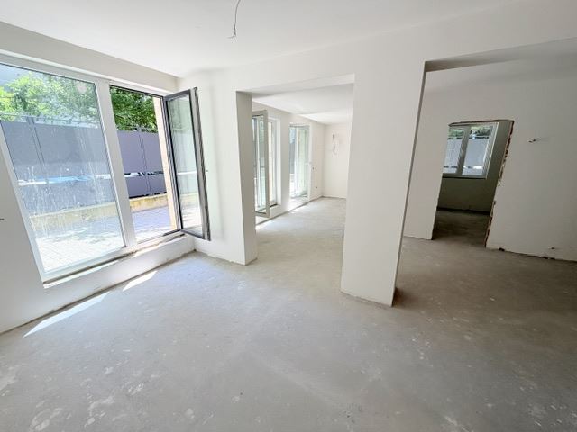 Two-bedroom apartment with private garden and two parking spaces in a new luxury building in the heart of Burgas