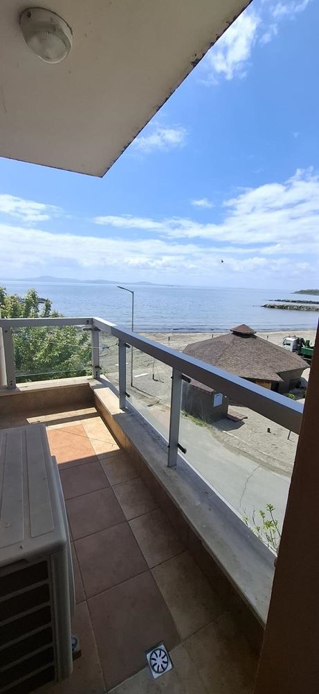 Three-room apartment on the first line with frontal sea view in Pomorie. With underground parking space!