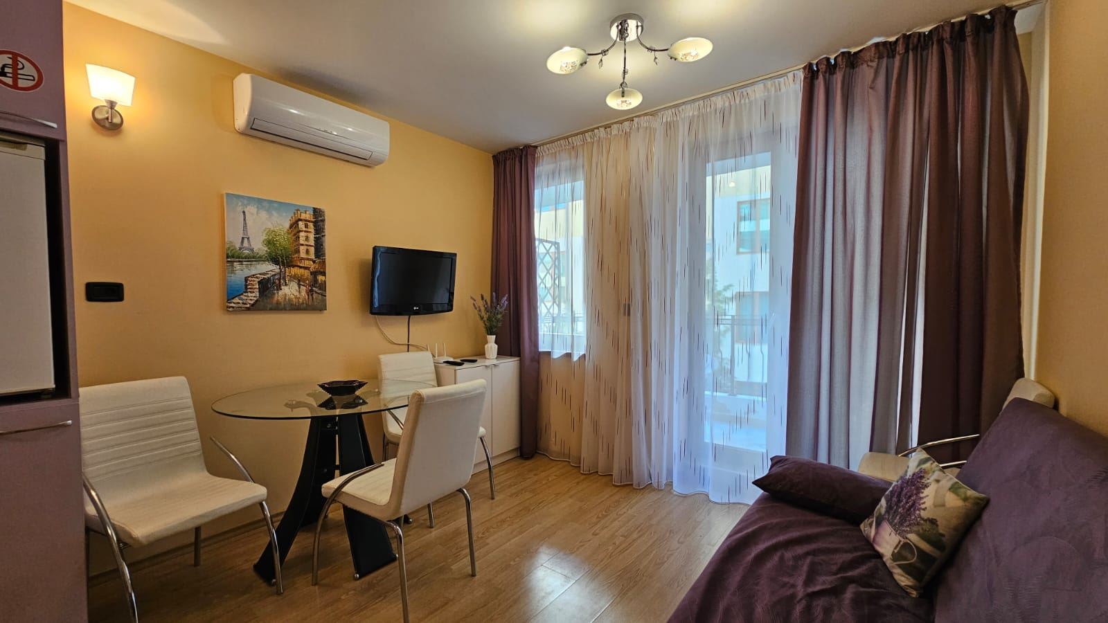 Cozy and stylishly furnished one-bedroom apartment with partial sea view