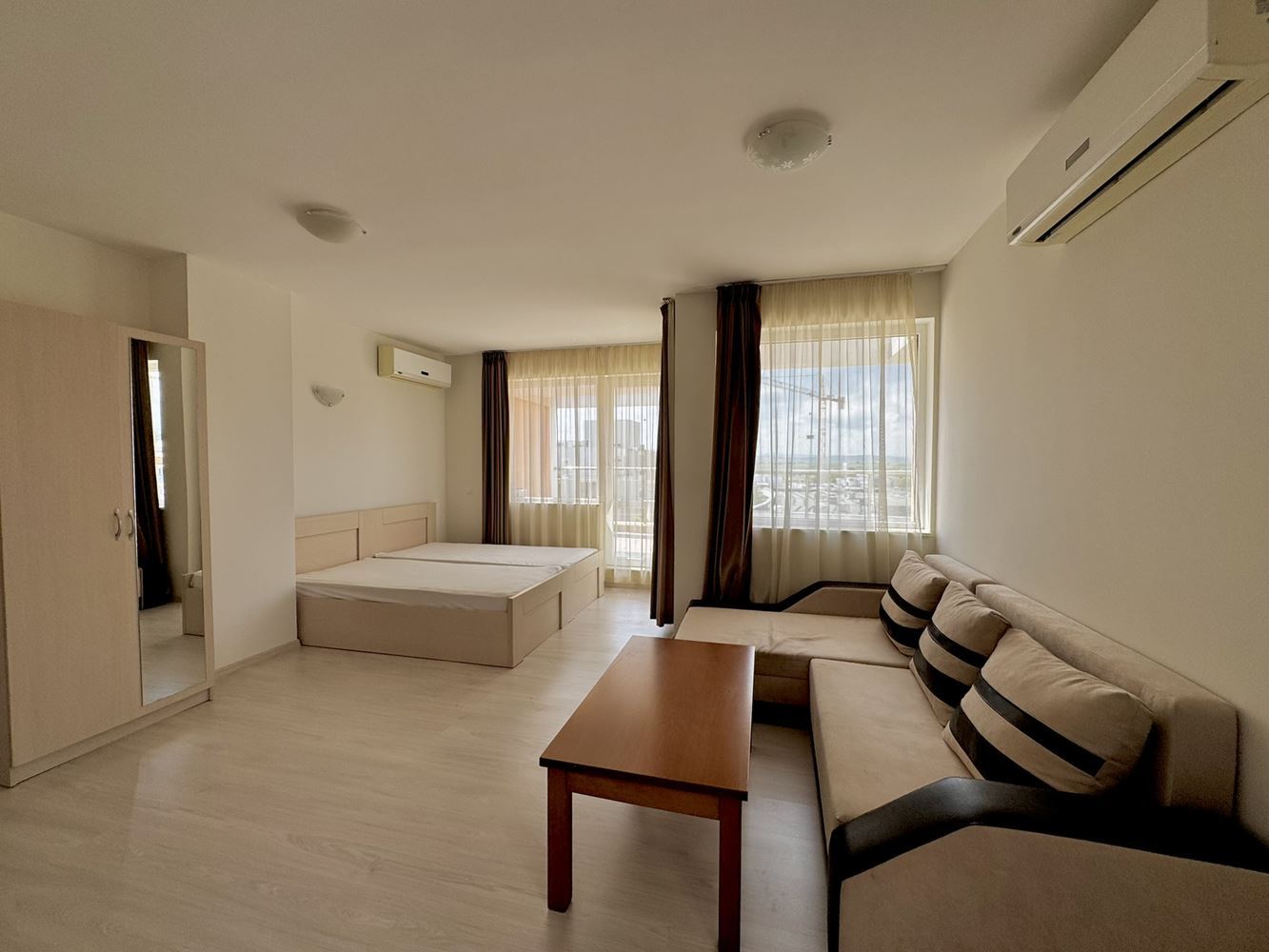 Spacious studio with a large panoramic terrace in Sunny Beach – excellent location and low maintenance fee