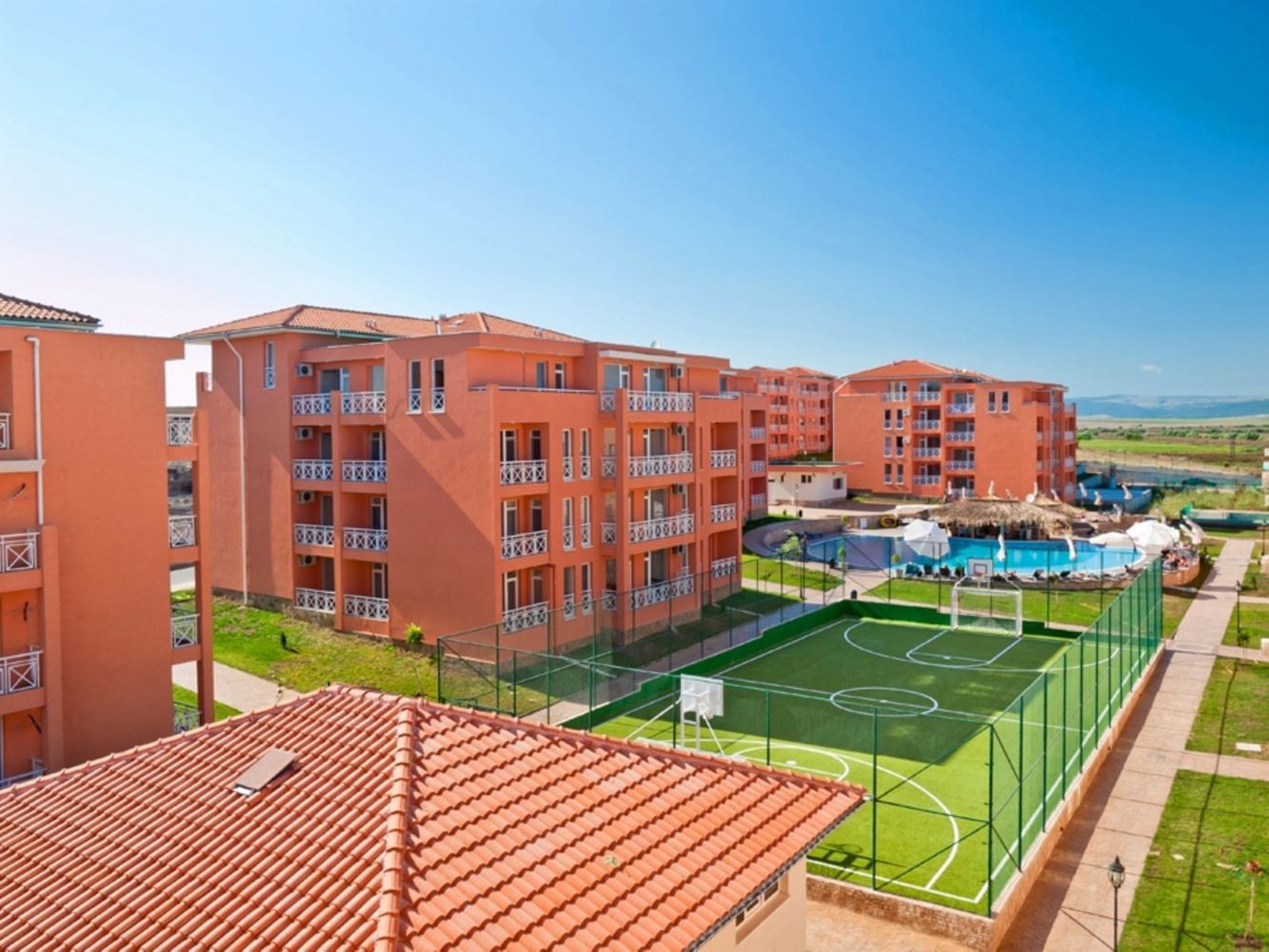 Modern one-bedroom apartment in a gated complex with pools and water attractions in the Sunny Beach area