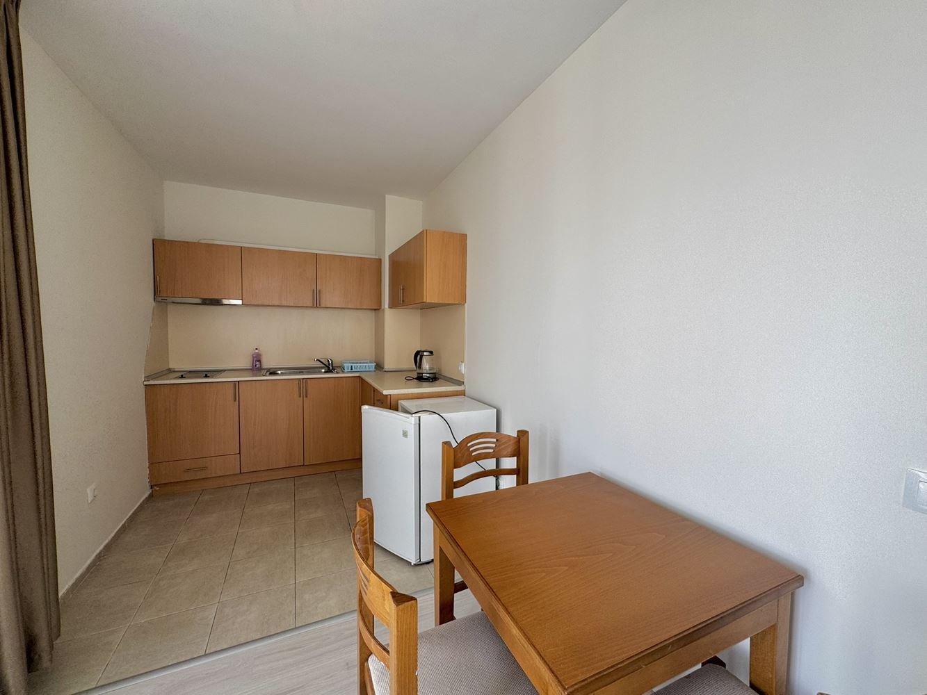 Spacious studio with a large panoramic terrace in Sunny Beach – excellent location and low maintenance fee