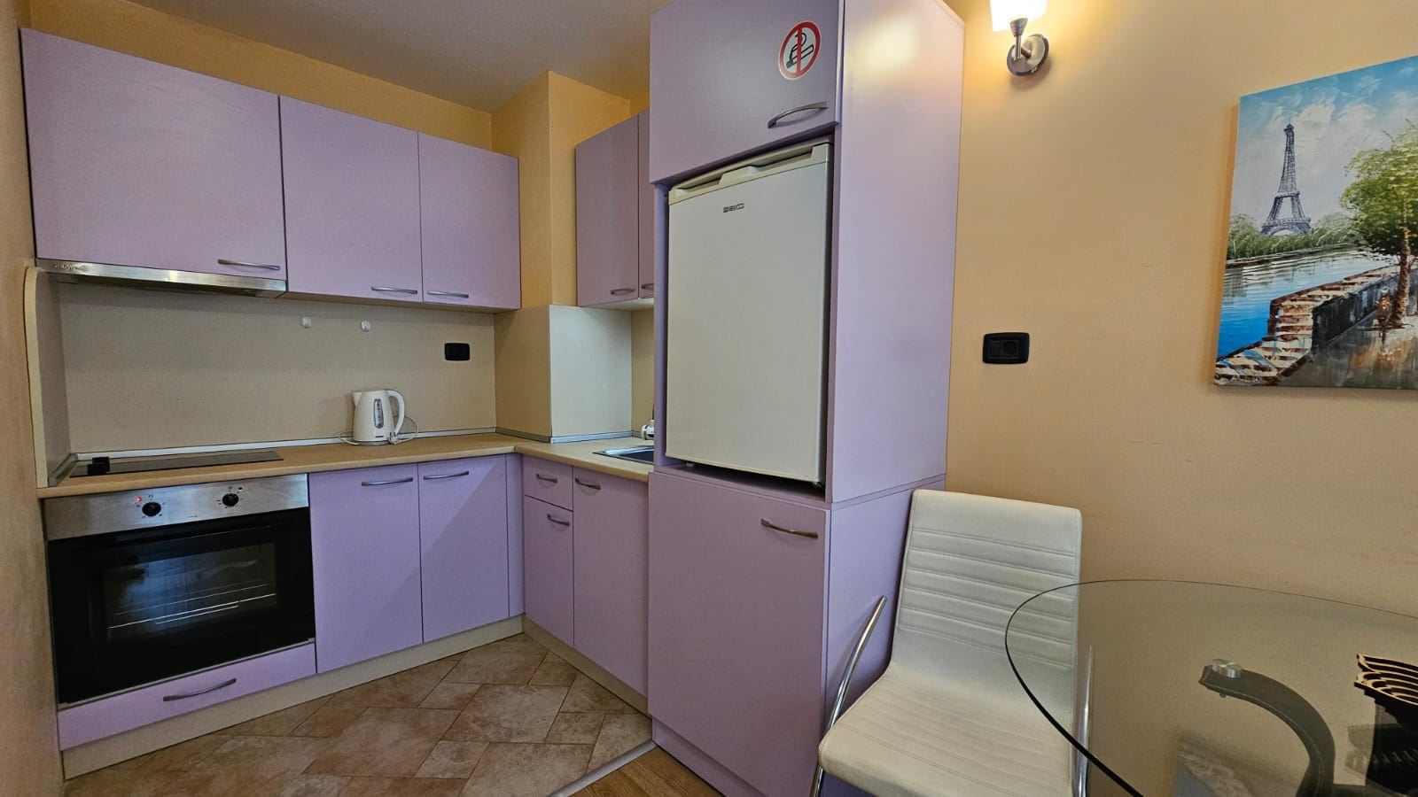 Cozy and stylishly furnished one-bedroom apartment with partial sea view
