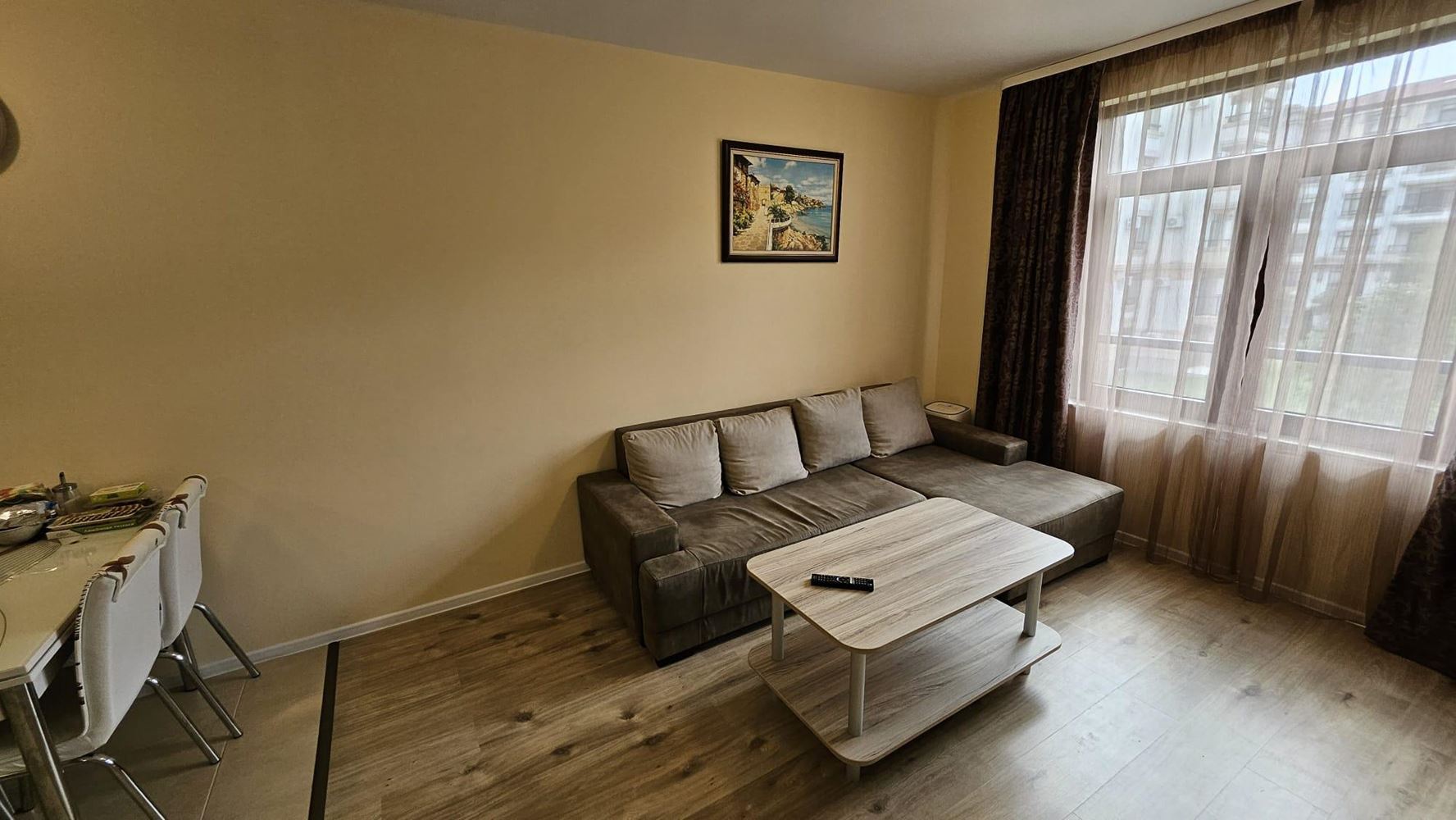 Cozy One-Bedroom Apartment in Pomorie with Low Maintenance Fee and View of a Landscaped Garden