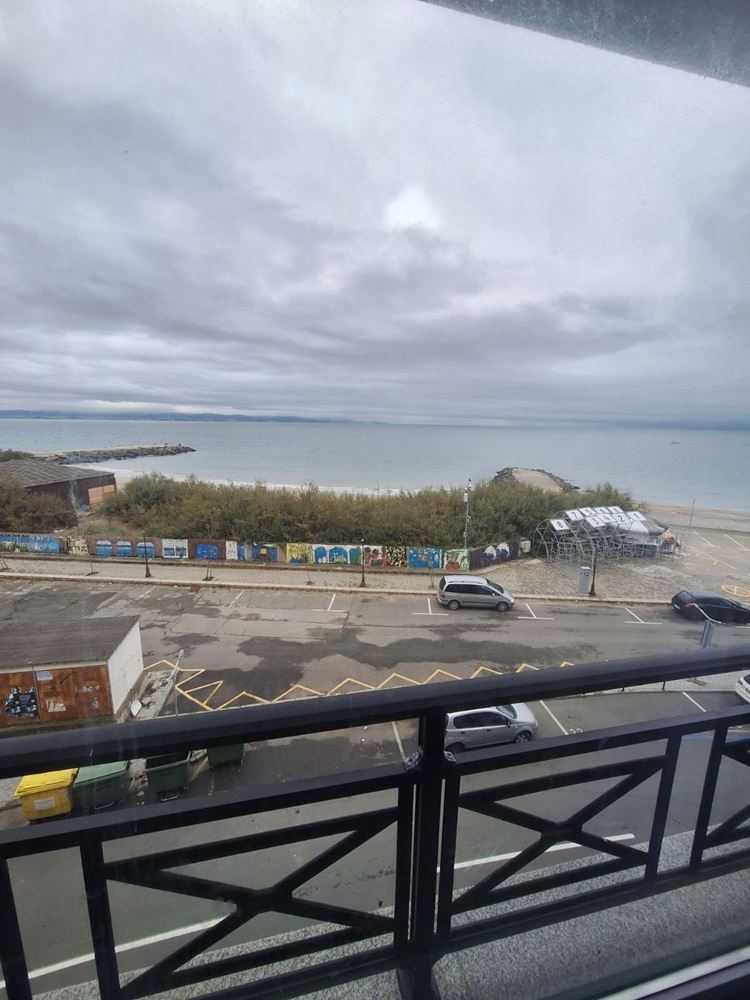 One-Bedroom Apartment on the First Sea Line with Panoramic Views and a Spacious Terrace