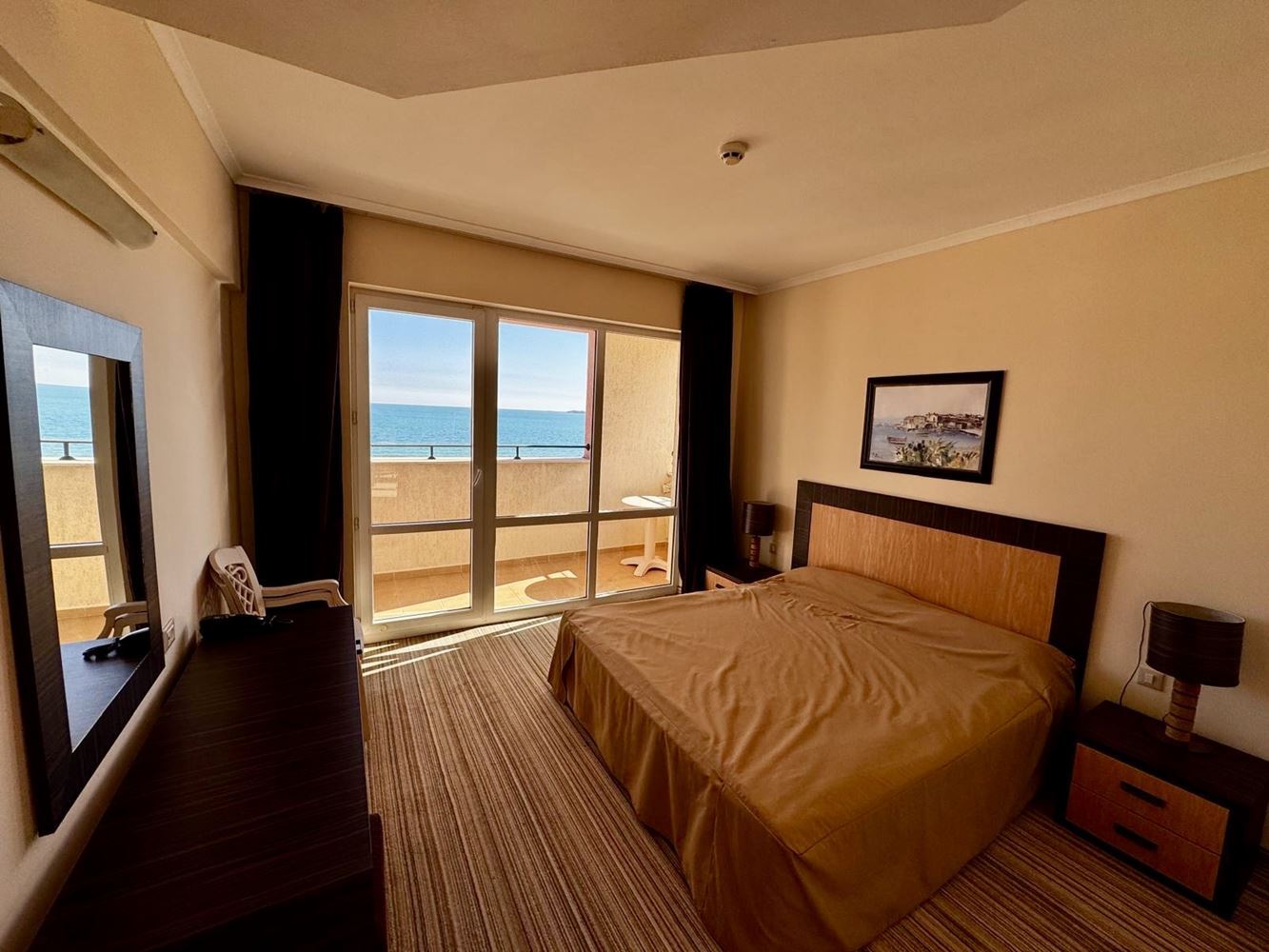 Spacious one-bedroom apartment with a large terrace and panoramic sea view