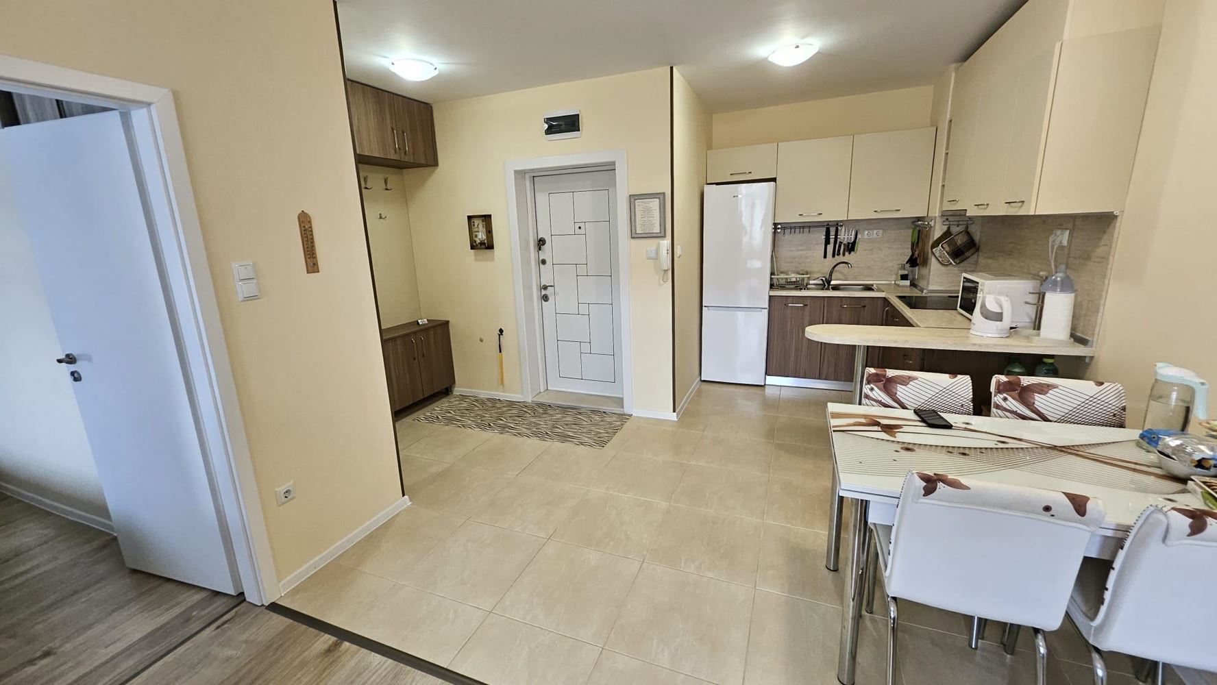 Cozy One-Bedroom Apartment in Pomorie with Low Maintenance Fee and View of a Landscaped Garden