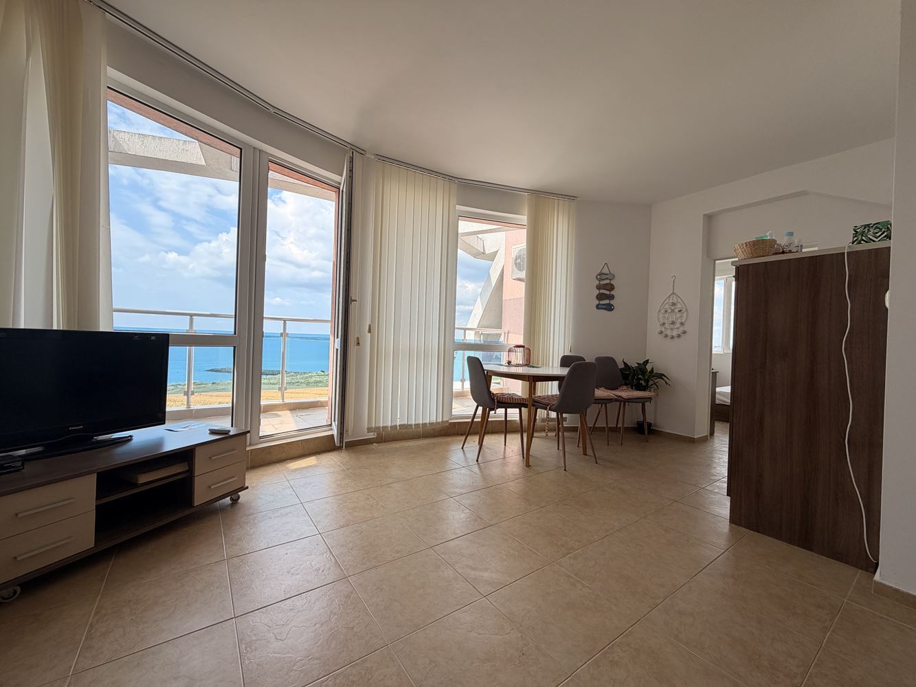 First Line with a Beautiful Sea Panorama – Spacious One-Bedroom Apartment with Two Terraces