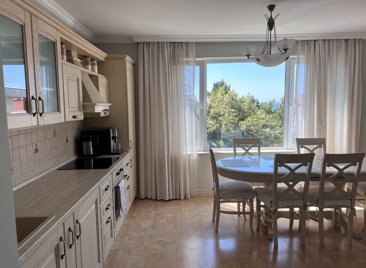 Spacious Three-Bedroom Apartment with Panoramic Sea View Only 50 Meters from the Beach – Low Maintenance Fee!