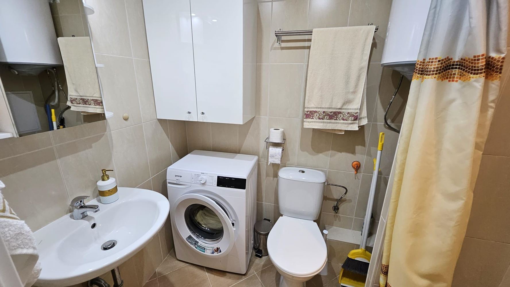 Cozy One-Bedroom Apartment in Pomorie with Low Maintenance Fee and View of a Landscaped Garden