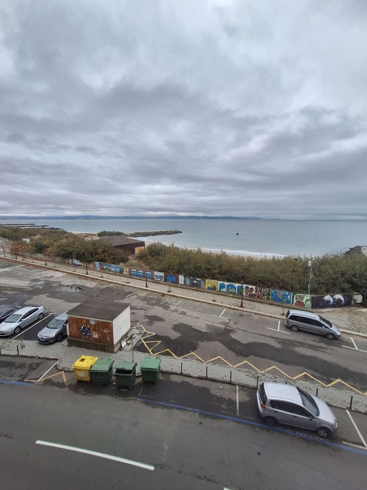 One-Bedroom Apartment on the First Sea Line with Panoramic Views and a Spacious Terrace