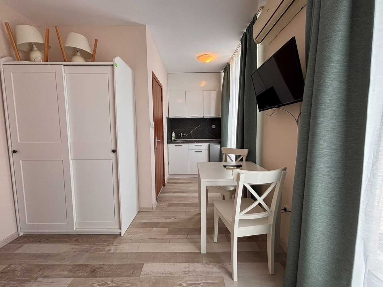 Furnished studio with panoramic terrace and pool view in Sunny Beach – comfort and SPA amenities all year round
