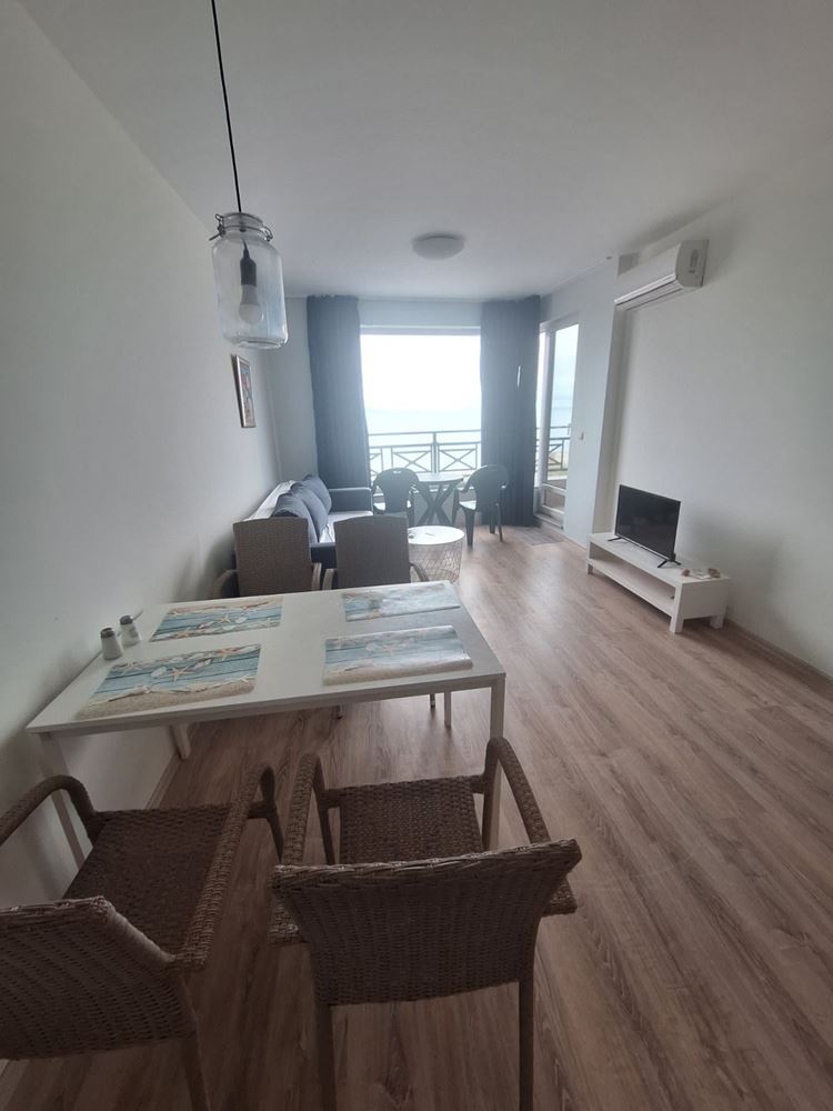 One-Bedroom Apartment on the First Sea Line with Panoramic Views and a Spacious Terrace