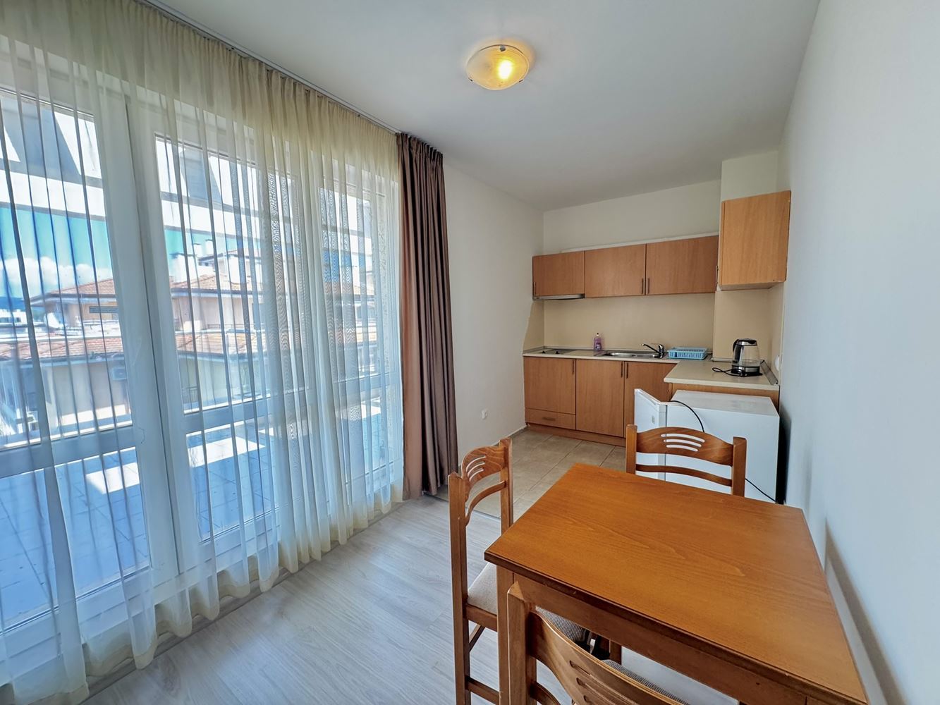Spacious studio with a large panoramic terrace in Sunny Beach – excellent location and low maintenance fee