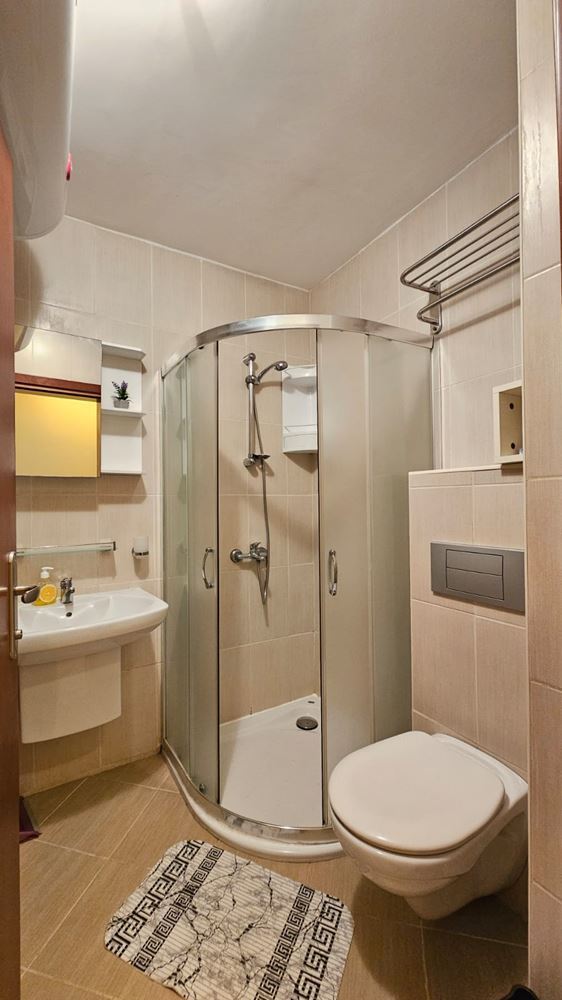 Cozy and stylishly furnished one-bedroom apartment with partial sea view