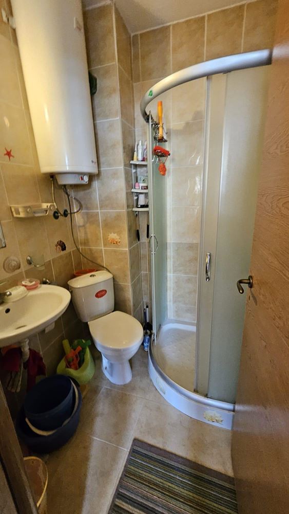 Modern one-bedroom apartment in a gated complex with pools and water attractions in the Sunny Beach area