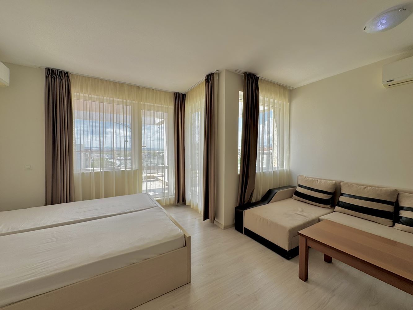 Spacious studio with a large panoramic terrace in Sunny Beach – excellent location and low maintenance fee