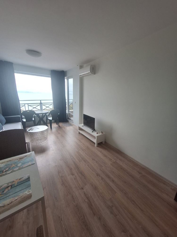 One-Bedroom Apartment on the First Sea Line with Panoramic Views and a Spacious Terrace