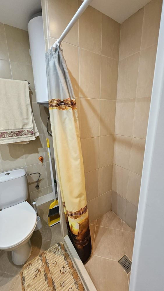 Cozy One-Bedroom Apartment in Pomorie with Low Maintenance Fee and View of a Landscaped Garden