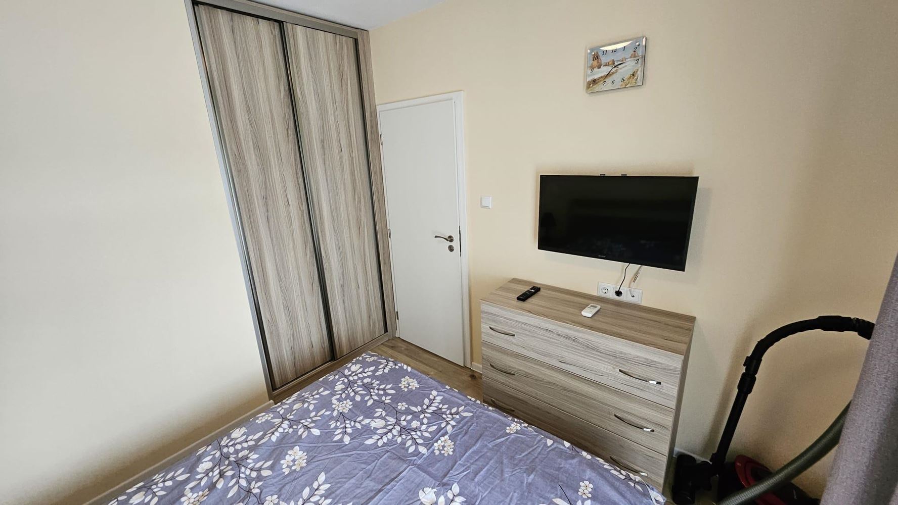 Cozy One-Bedroom Apartment in Pomorie with Low Maintenance Fee and View of a Landscaped Garden