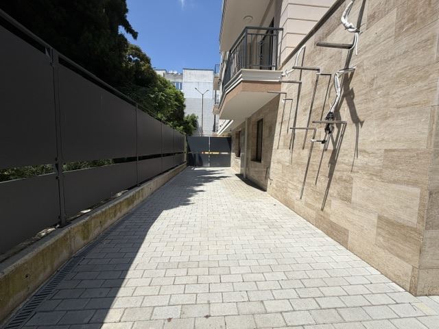 Two-bedroom apartment with private garden and two parking spaces in a new luxury building in the heart of Burgas