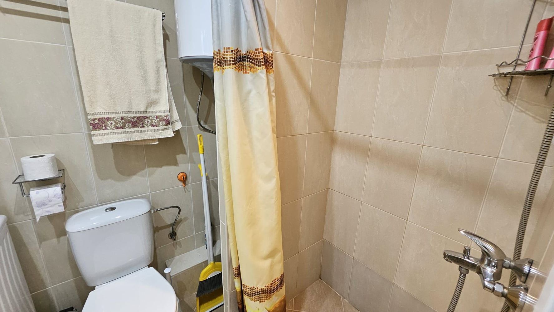 Cozy One-Bedroom Apartment in Pomorie with Low Maintenance Fee and View of a Landscaped Garden