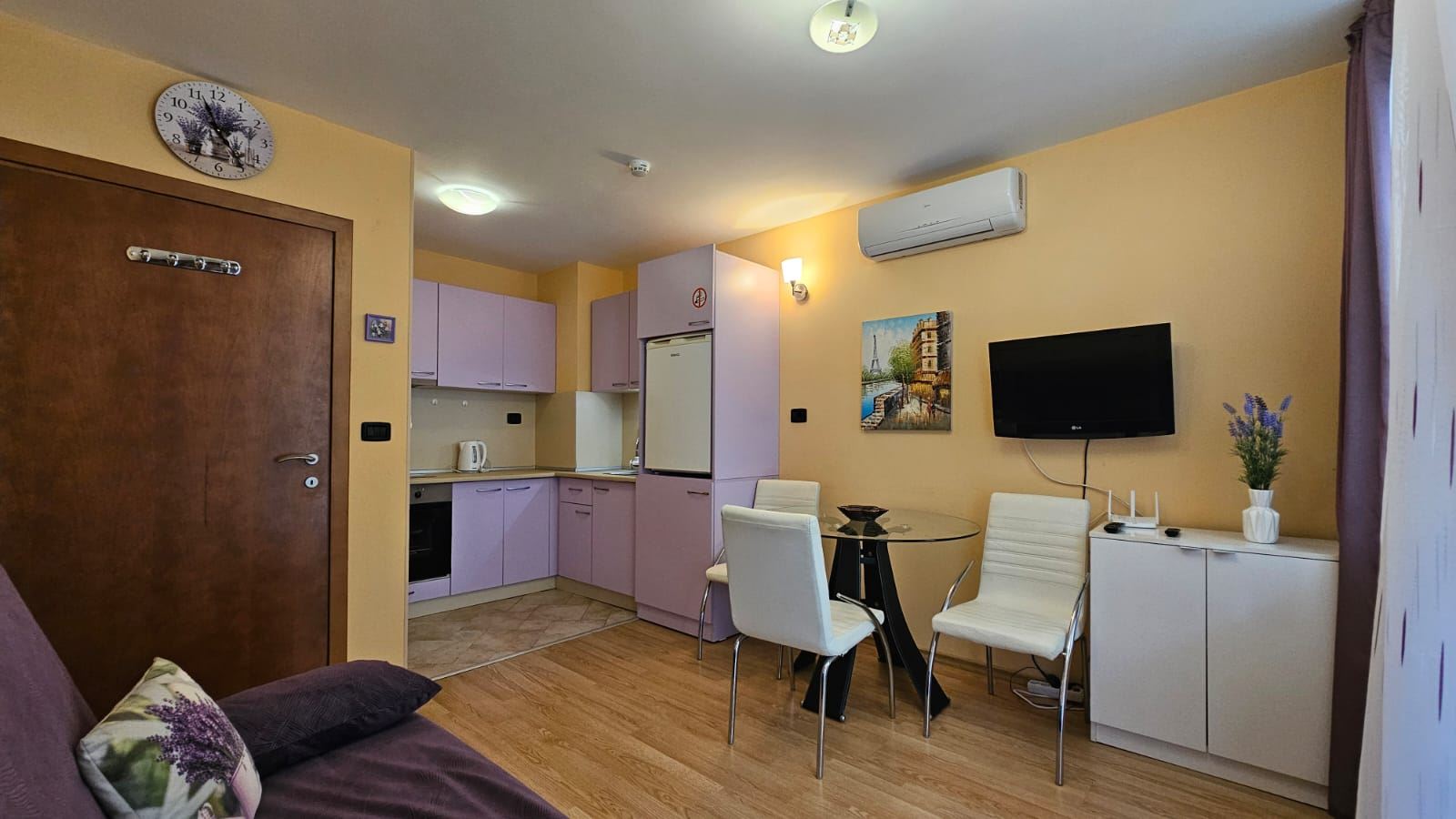 Cozy and stylishly furnished one-bedroom apartment with partial sea view