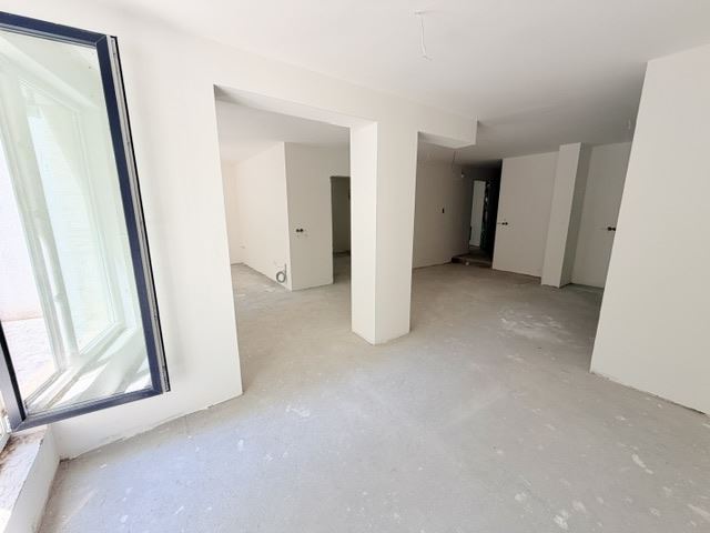 Two-bedroom apartment with private garden and two parking spaces in a new luxury building in the heart of Burgas