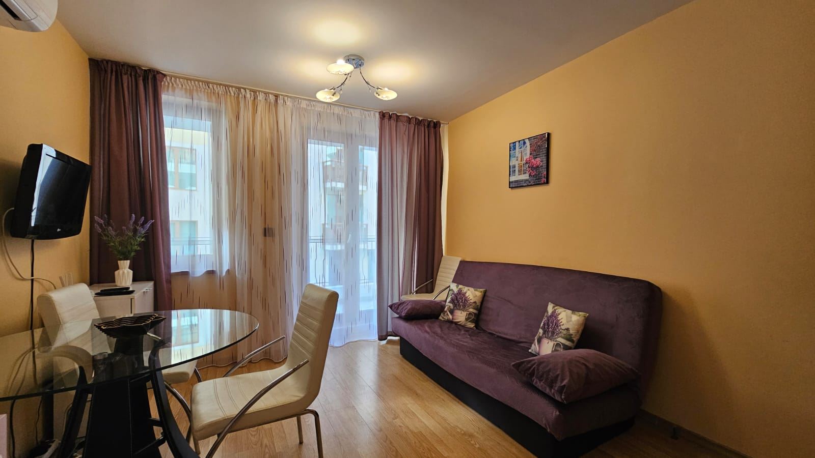 Cozy and stylishly furnished one-bedroom apartment with partial sea view