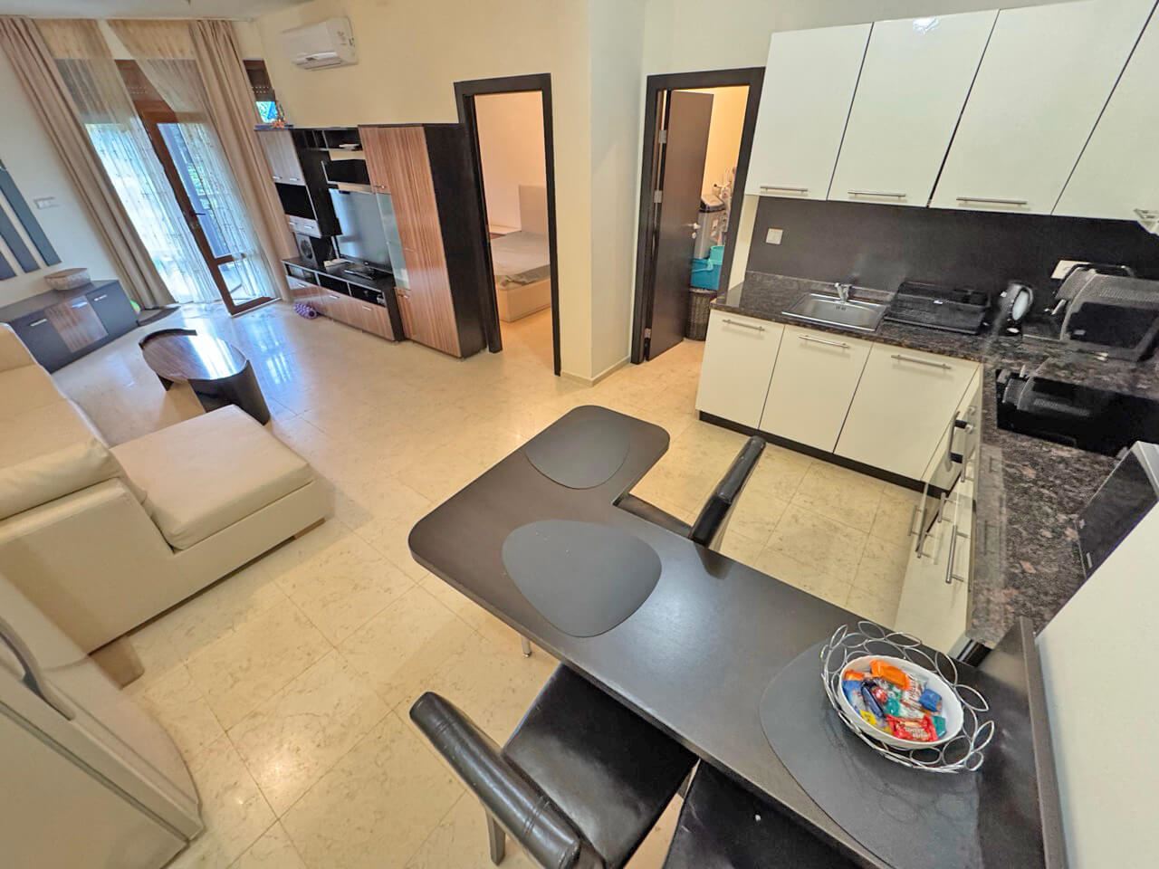 Elegant One-Bedroom Apartment on the First Sea Line in Sveti Vlas with Direct Access to Garden and Pool