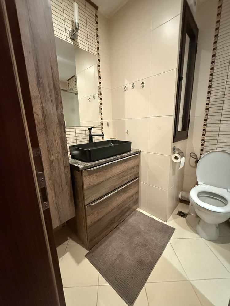 Furnished one-bedroom apartment in an elite complex with swimming pools and sports facilities
