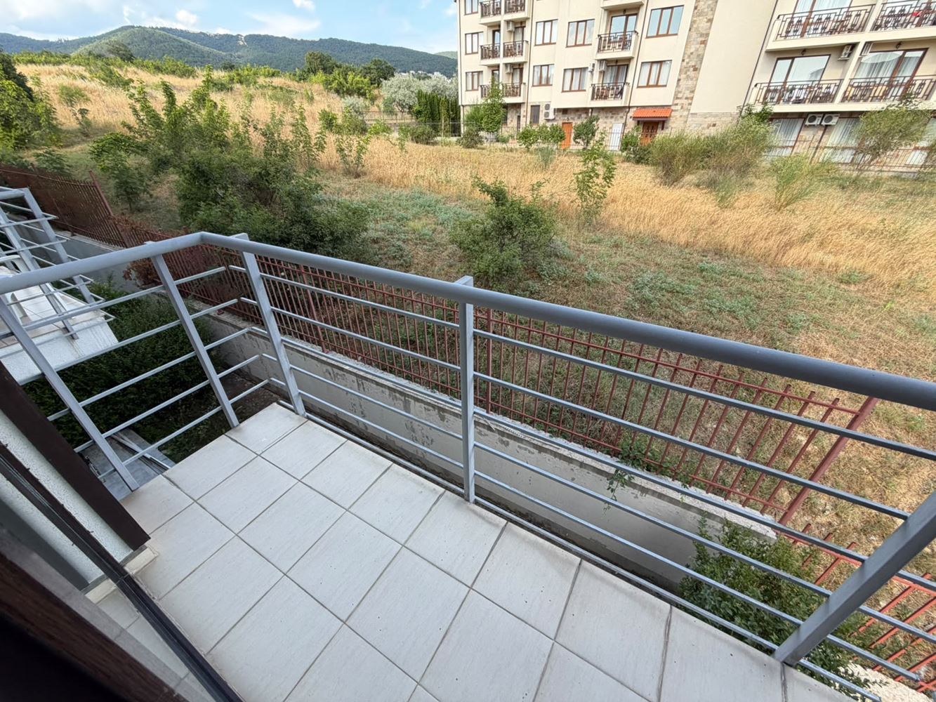 Spacious two-bedroom apartment with sea and mountain views in a beautiful gated complex near the sea