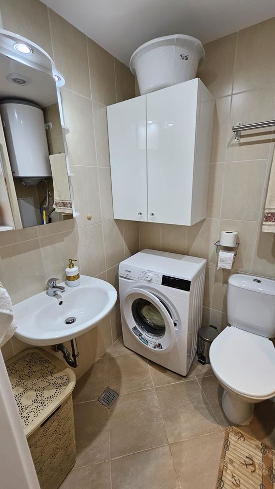 Cozy One-Bedroom Apartment in Pomorie with Low Maintenance Fee and View of a Landscaped Garden