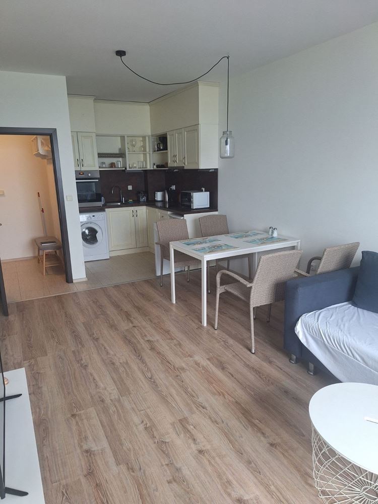 One-Bedroom Apartment on the First Sea Line with Panoramic Views and a Spacious Terrace