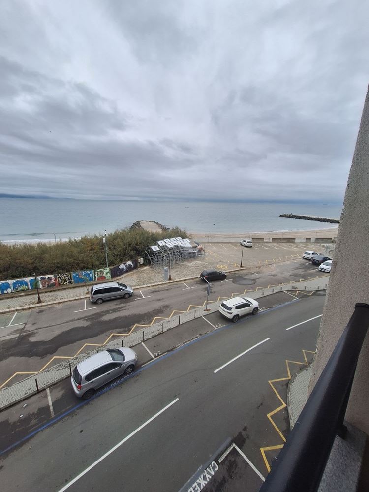 One-Bedroom Apartment on the First Sea Line with Panoramic Views and a Spacious Terrace