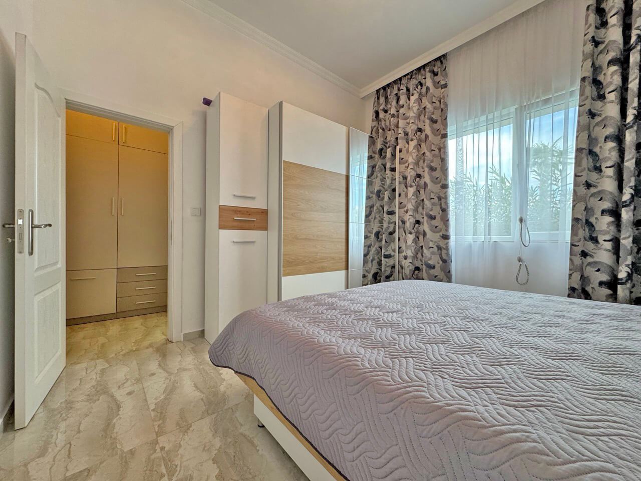 Spacious one-bedroom apartment with a large terrace and pool view in Sunny Beach