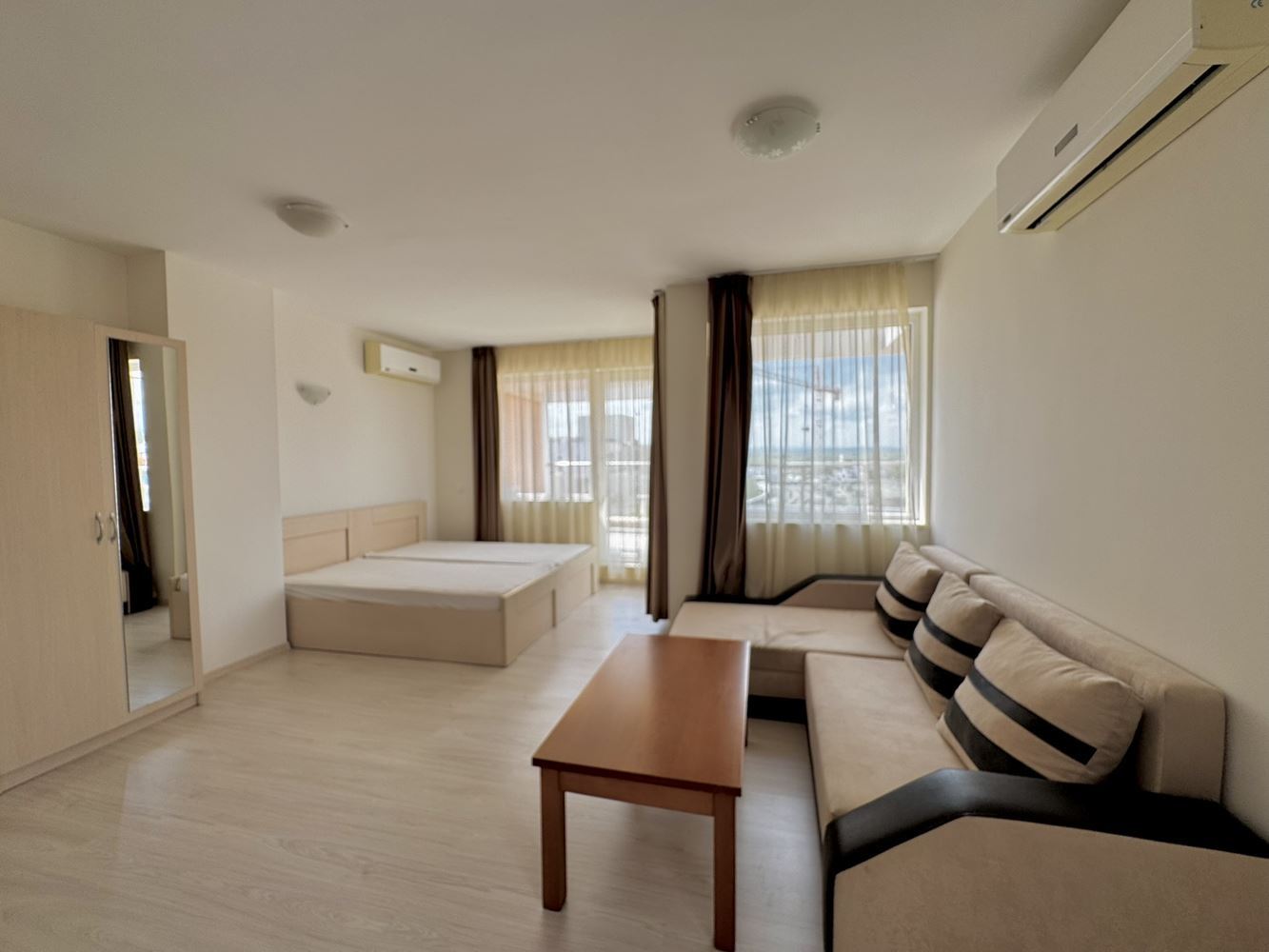 Spacious studio with a large panoramic terrace in Sunny Beach – excellent location and low maintenance fee