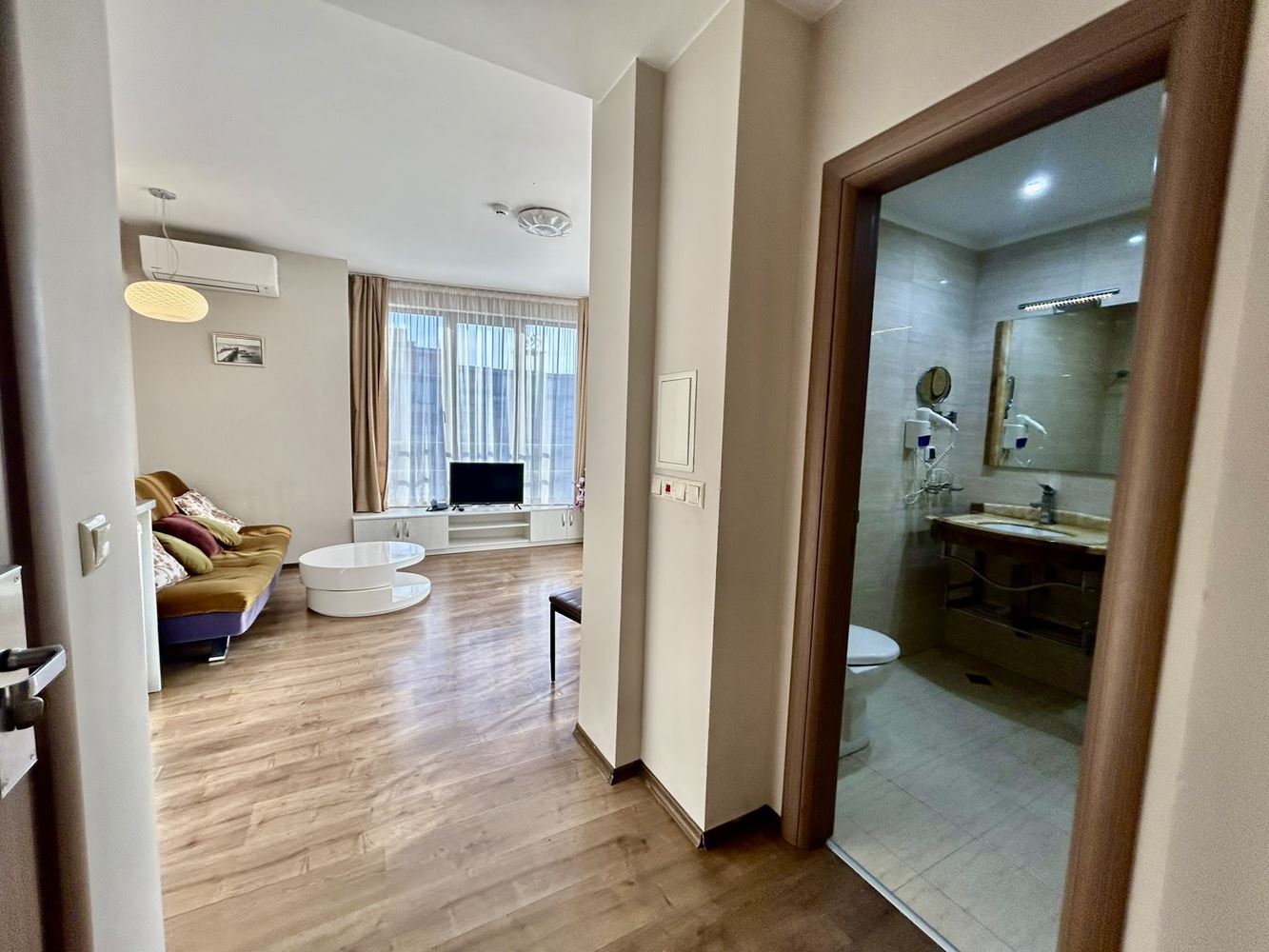 Two-room apartment with a pool view in a complex with extensive infrastructure
